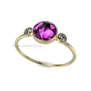 round amethyst ring accented with cubic zirconia