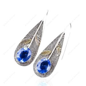 925 Sterling Silver Blue Topaz Dangle Earrings - Image 1